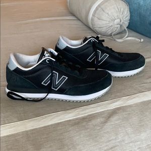 New Balance 501 black tennis shoes